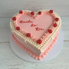 Elegant Heart-Shaped Cake with Beading and Cherries