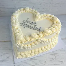 All White Heart-Shaped Wedding Cake