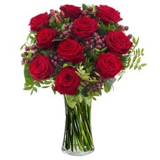 Naughty Love with 10 red roses and hypericums