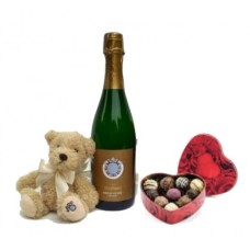 Sparkling Wine, Chocolates And A Bear