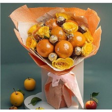 Citrus Bloom Elegance Bouquet With Oranges , Six Ferrero Chocolates And Yellow Roses