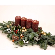 Advent bowl with pine and rustic candles