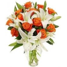 Vase Of Orange Roses And White Oriental Lilies