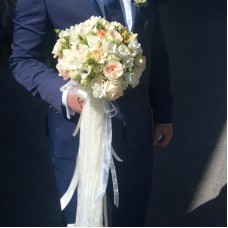 Bridal bouquet of light colour flowers