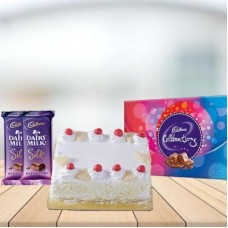 Square Pineapple Cake with Assorted Chocolates Combo (1/2 kg Square Pineapple Cake With Cadbury Celebration and 3 Cadbury Dairy Milk Silk (60 gm))