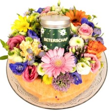 Get well soon cake tin of licorice sticks (Get Well Soon 16 cm pastel multicolored flower cake on a glass base plate with a tin of Get Well Soon licorice crayons.)