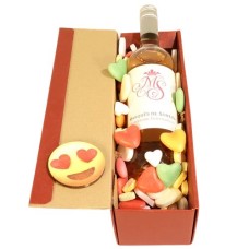 Marques Rose wine with mixed heart-shaped candy (Marques Tempranillio Rose wine in a luxury red gift box with a smiley and filled with mixed heart-shaped candy.)