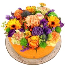 Bouquet Gift flower cake (Flower cake medium orange purple green on a glass base plate)