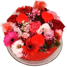 Love flower cake (Medium red-pink Valentines flower cake with hearts on a glass base)