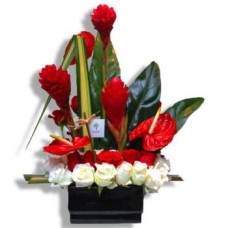 Red and white roses with tropical flowers