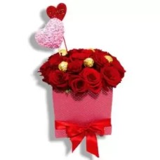 Red roses with some chocolate