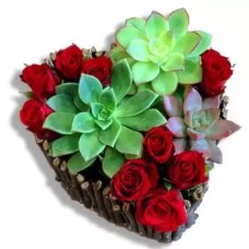Roses and succulents in heart design
