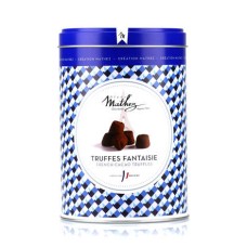 Fancy truffles with crispy crpe chips in vintage tin