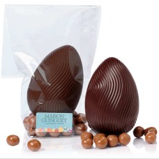 Dark chocolate striped egg with milk chocolate caramel cereal pearls (120g bag)