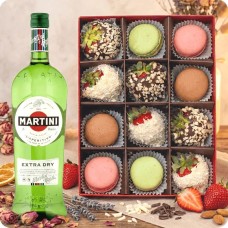 Strawberries in white and milk chocolate with coconut and nut topping and macaroons + Martini