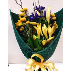 Yellow and Purple arrangement in Green Wrap