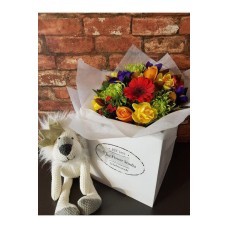 Flowers sent with a Soft toy