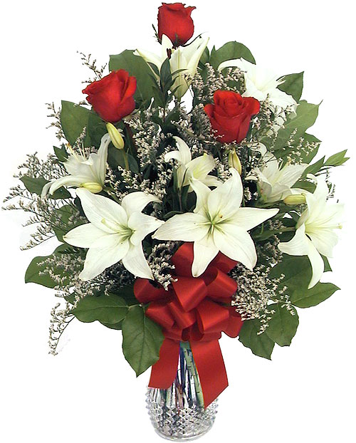 Lilies With Red Roses In A Vase