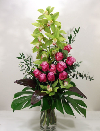 Luxurious bouquet with green orchids and roses