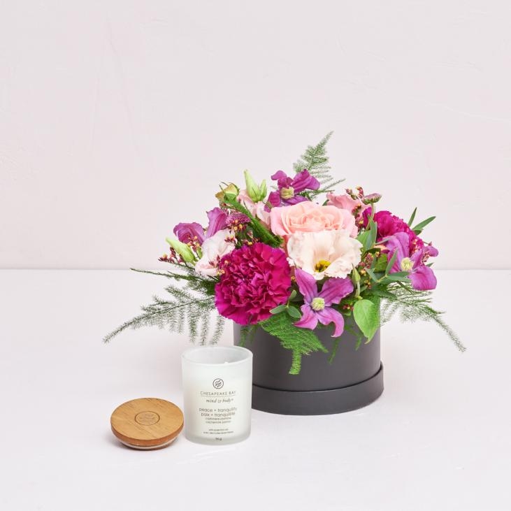 The florist's creative choice in a box with scented candles
