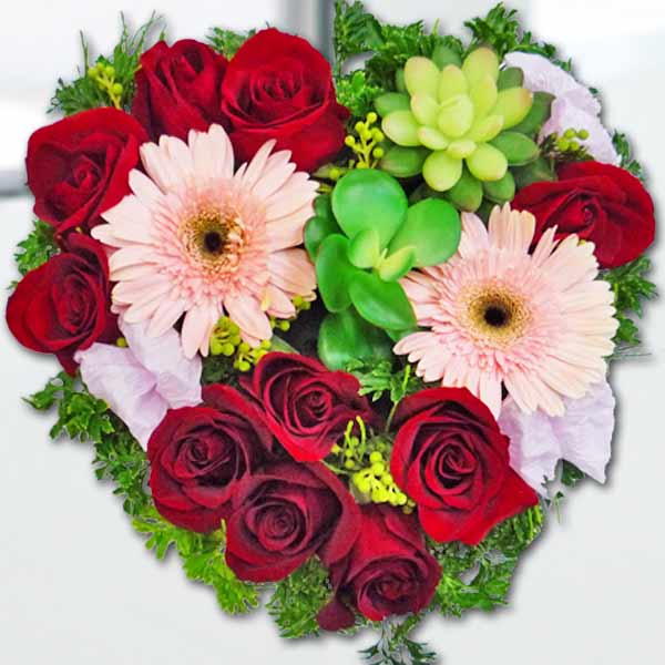 10 Red Roses In Heart-Shape Table Arangement