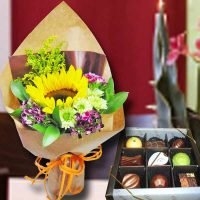 Small Sunflower Handbouquet and Chocolate.