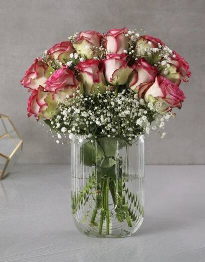 Classy Roses And Million Star Clear Vase