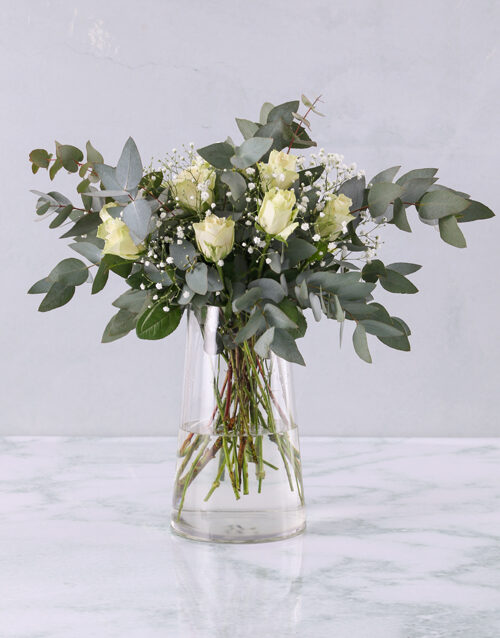 White Roses In Clear Modern Vase