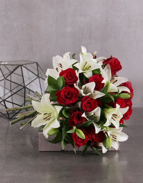 Striking Red Roses and White Lilies