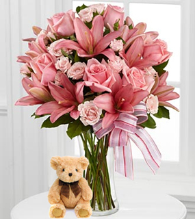 Pink Paradise (12 Roses + 3 Lilies + Teddy Bearus)