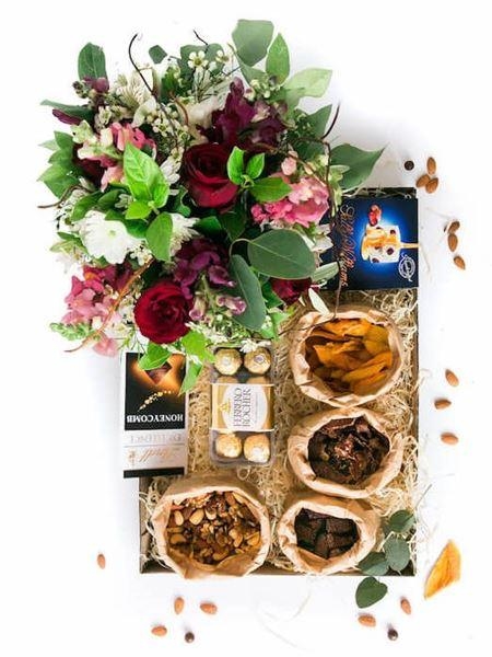 Decadent Jumbo Snack Box with Floral Arrangement