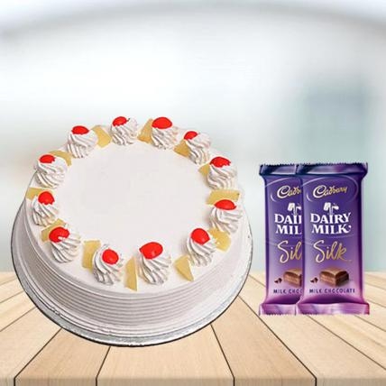 Pineapple Cake with Cadbury Silk Combo (1/2 kg Pineapple Cake With 5 Cadbury Dairy Milk Silk (60 gm))
