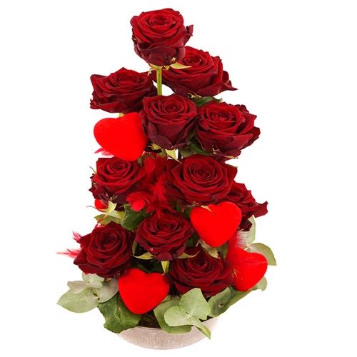 Tower of red roses with hearts and feathers