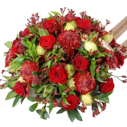 Round funeral arrangement red and green (Funeral arrangement approx 45cm round red - green)