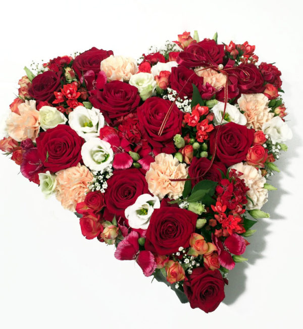 Heart-shepad arrangement of red, cream and white colors