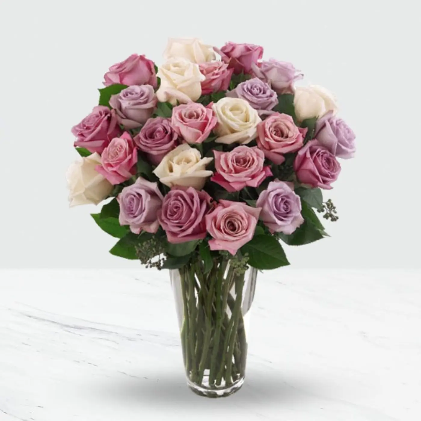 24 pink and purple roses in a vase