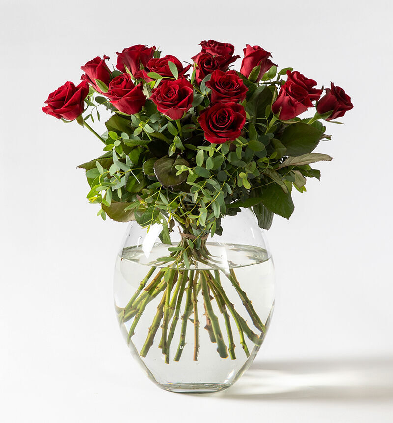 Red rose bouquet with green