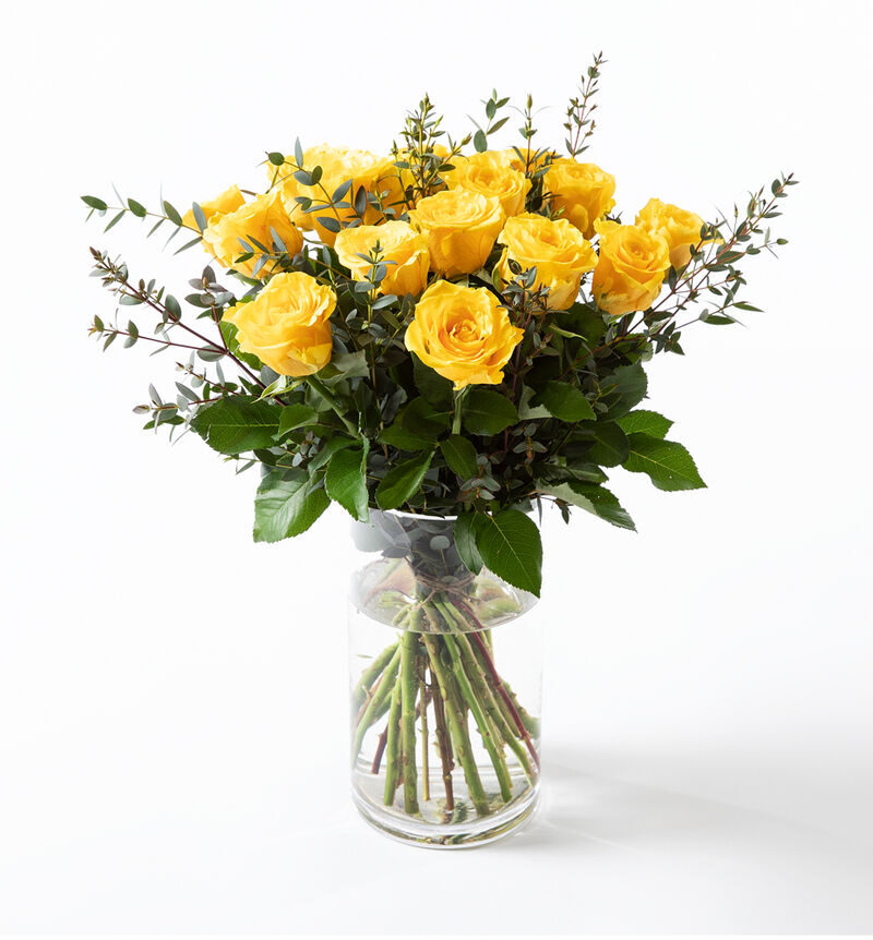 15 yellow roses with green