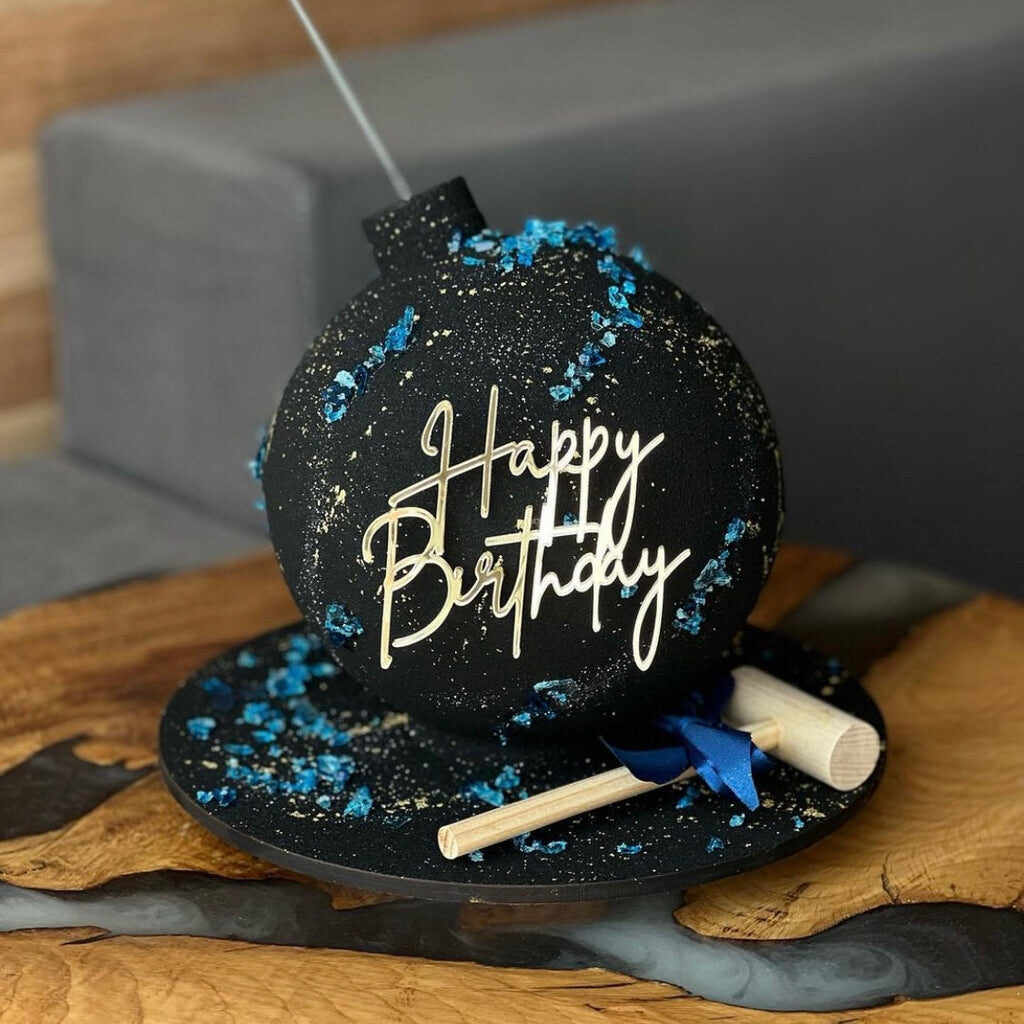 Black Bomb Cake with Blue Crystals