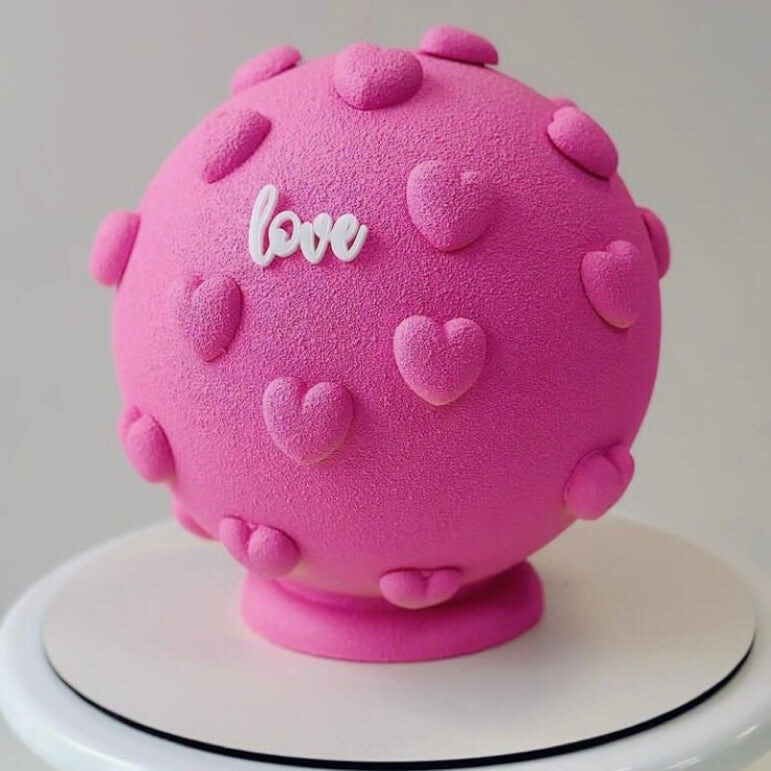 Pink Bomb Cake with hearts