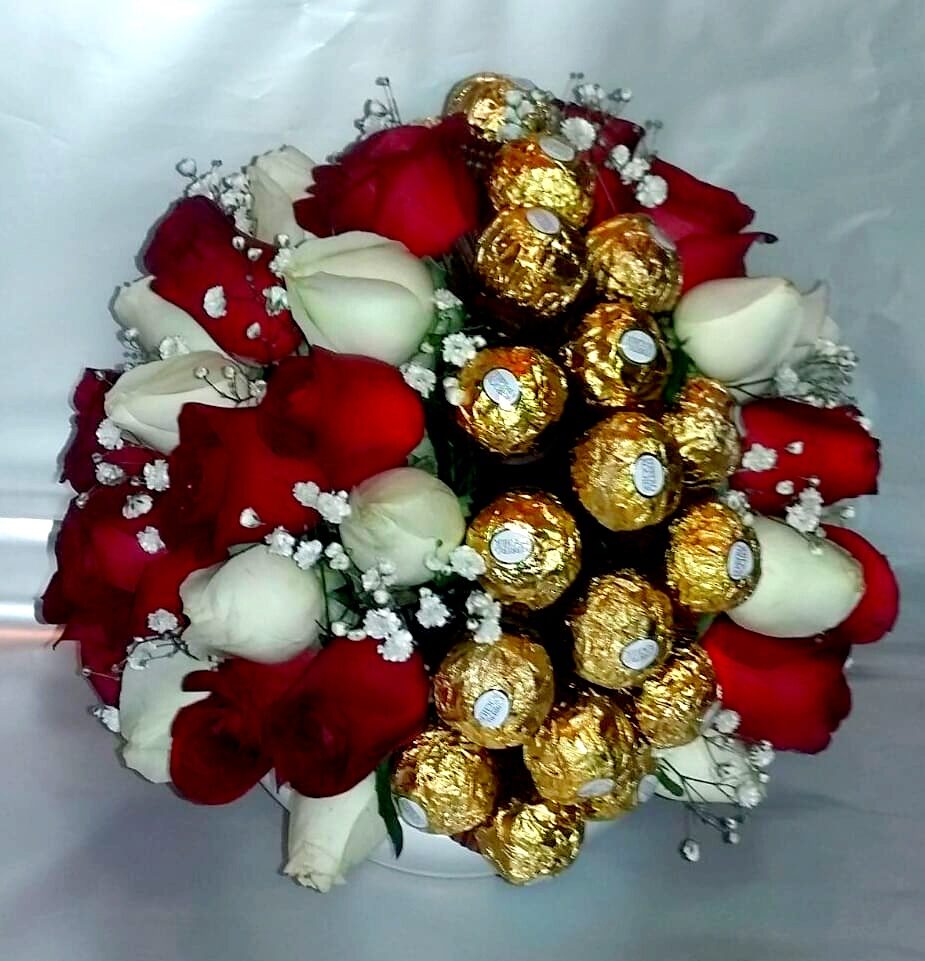 Arrangement with roses and Ferrero Rocher
