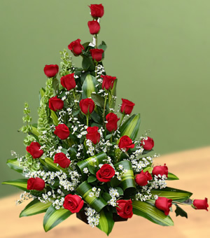 Floral arrangement roses in basket