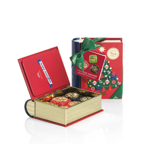 Mini metal book filled with Chocoviar 75% chocolate bites, Creme Brulee and Pistachio