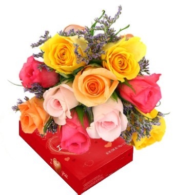 Bouquet of 12 mixed roses. Chocolates included