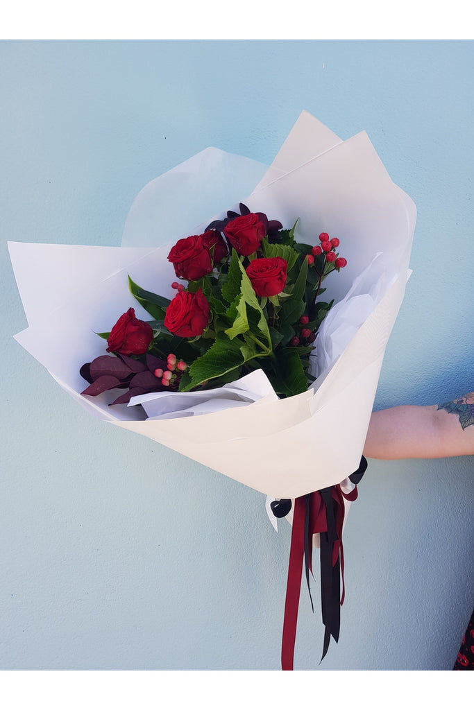 Half a Dozen of Red Roses