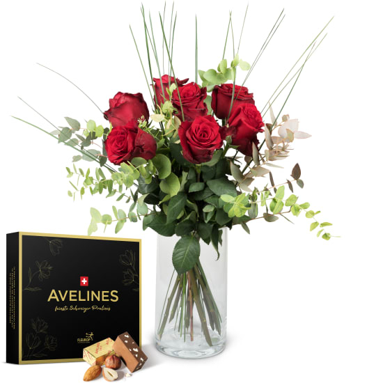 7 Red Roses with greenery and Avelines pralines from Maestrani