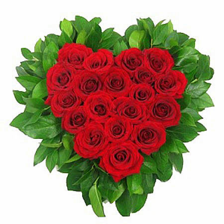Heart of red roses and greenery